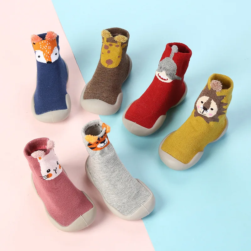 https://tinytrainers.co.uk/wp-content/uploads/2023/12/HZaUSpring-and-Fall-Models-of-Children-s-Walking-Shoes-Floor-Socks-Infant-Non-slip-Soft-Bottom.webp